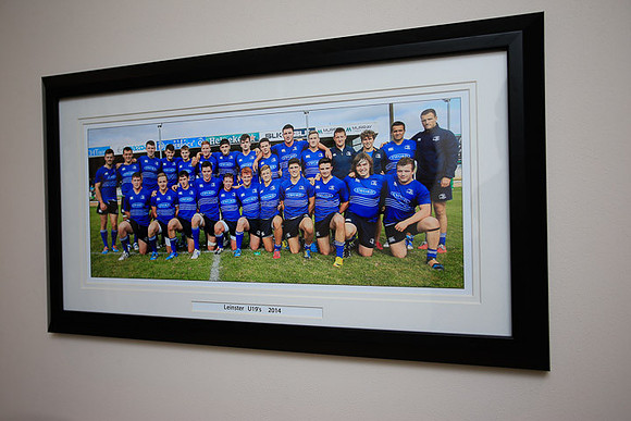 18"x7.5" Framed Team shot, with caption.